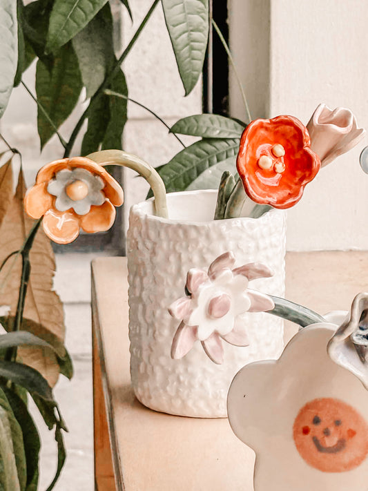 Création de vase et fleur en céramique
